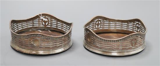 A pair of early 19th century silver plated bottle coasters diameter 13cm